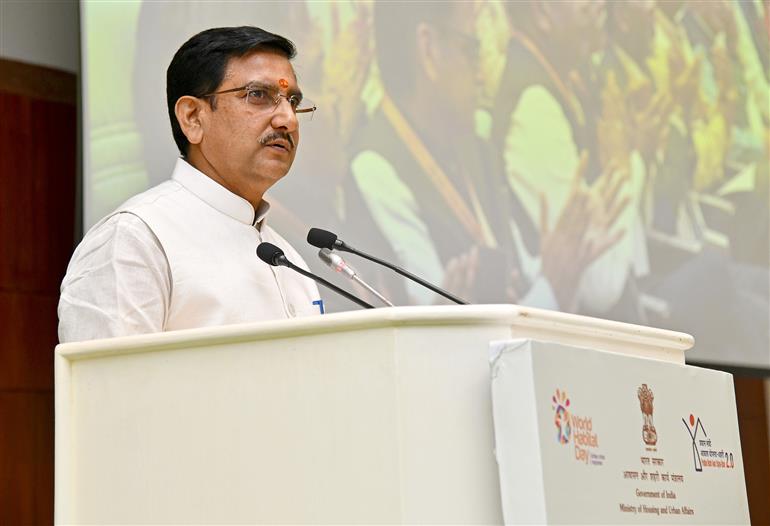 The Minister of State for Housing & Urban Affairs, Shri Tokhan Sahu addressing at the event World Habitat Day at Vigyan Bhawan, in New Delhi on October 08, 2025.