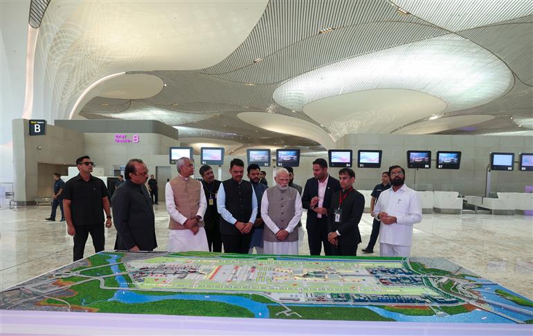 PM visits an exhibition during the inauguration of the Navi Mumbai International Airport at Mumbai, in Maharashtra on October 08, 2025. 