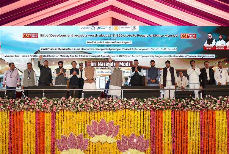 PM at the inauguration of the Navi Mumbai International Airport and Mumbai Metro Line-3 at Mumbai, in Maharashtra on October 08, 2025. 