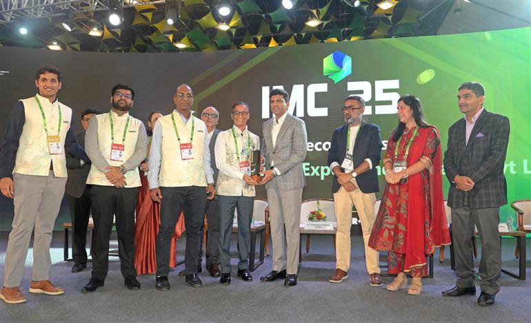 The Minister of State for Rural Development and Communications, Dr. Chandra Sekhar Pemmasani felicitates the winners of the India Mobile Congress 2025 Awards in a ceremony at Yashobhoomi, Dwarka, in Delhi on October 10, 2025.