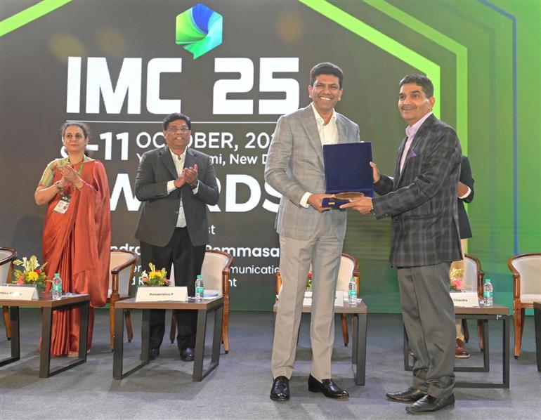 The Minister of State for Rural Development and Communications, Dr. Chandra Sekhar Pemmasani felicitates the winners of the India Mobile Congress 2025 Awards in a ceremony at Yashobhoomi, Dwarka, in Delhi on October 10, 2025.