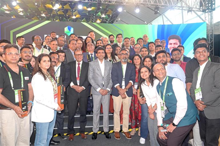 The Minister of State for Rural Development and Communications, Dr. Chandra Sekhar Pemmasani in a group photograph at India Mobile Congress 2025 Awards ceremony at Yashobhoomi, Dwarka, in Delhi on October 10, 2025.