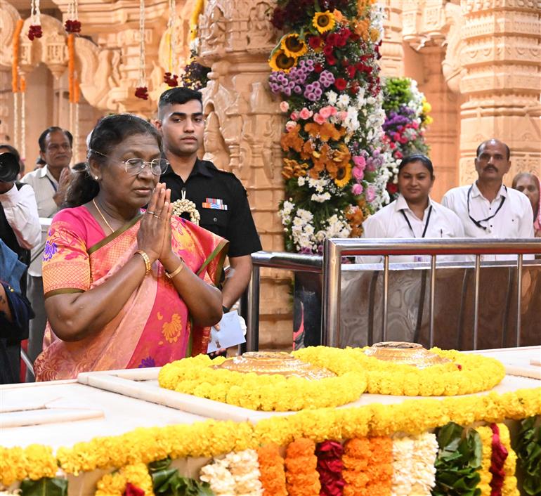 The President of India, Smt Droupadi Murmu performs Darshan and Puja at the Somnath Temple also paid floral tributes at the statue of Sardar Vallabhbhai Patel near the temple on her arrival, in Gujarat on October 10, 2025.