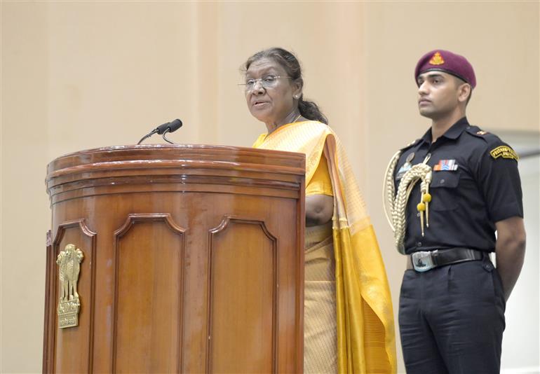 The President of India, Smt Droupadi Murmu addressing the National Conclave on ‘Adi Karmayogi Abhiyan’ at Vigyan Bhawan, in New Delhi on October 17, 2025.
