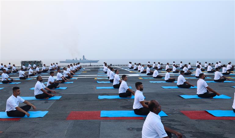 Glimpses of the brave naval personnel took part in a Yoga session at INS Vikrant on October 20, 2025. PM witnesses the session.