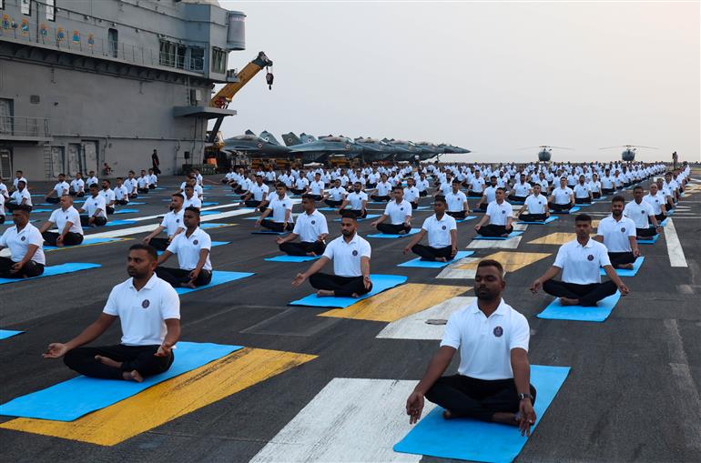 Glimpses of the brave naval personnel took part in a Yoga session at INS Vikrant on October 20, 2025. PM witnesses the session.
