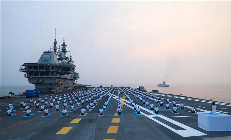 Glimpses of the brave naval personnel took part in a Yoga session at INS Vikrant on October 20, 2025. PM witnesses the session.