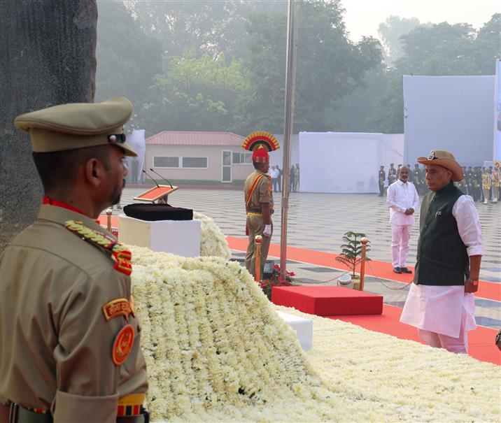 The Union Minister for Defence, Shri Rajnath Singh lays wreath and pays glowing tributes to police & paramilitary forces for their service to the nation on the occasion of Police Commemoration Day at National Police Memorial, in New Delhi on October 21, 2025.