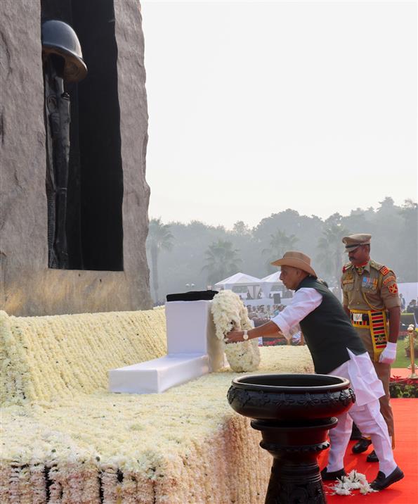 The Union Minister for Defence, Shri Rajnath Singh lays wreath and pays glowing tributes to police & paramilitary forces for their service to the nation on the occasion of Police Commemoration Day at National Police Memorial, in New Delhi on October 21, 2025.