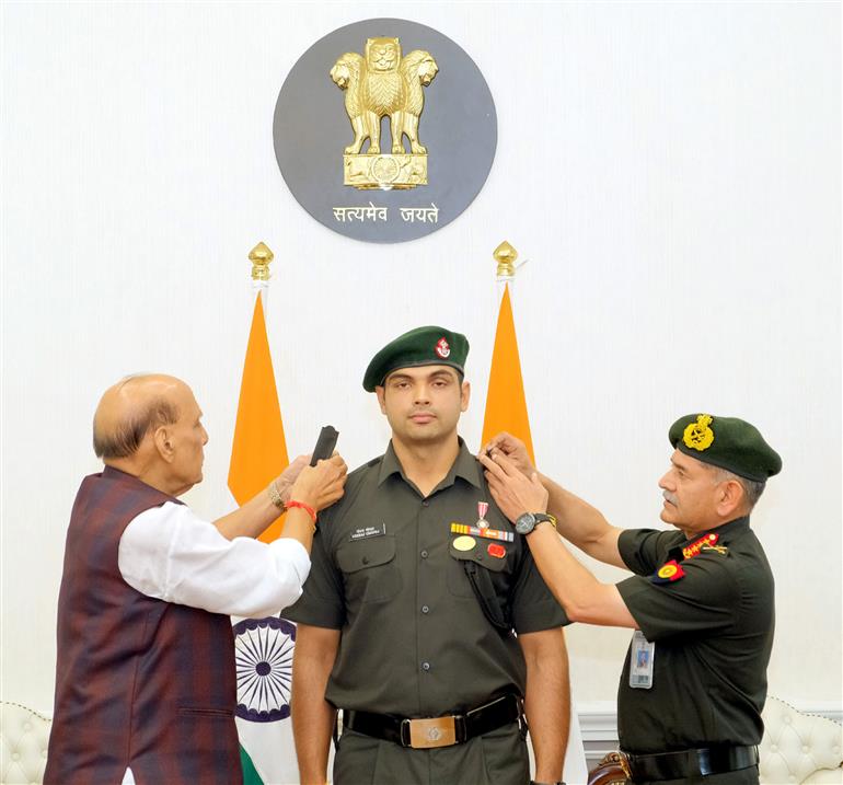 The Union Minister for Defence, Shri Rajnath Singh conferred the gleaming insignia of Honorary rank of Lieutenant Colonel in the Territorial Army upon star javelin thrower and two-time Olympic medalist Neeraj Chopra during the pipping ceremony in South Block, New Delhi on October 22, 2025.