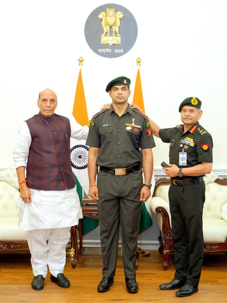 The Union Minister for Defence, Shri Rajnath Singh conferred the gleaming insignia of Honorary rank of Lieutenant Colonel in the Territorial Army upon star javelin thrower and two-time Olympic medalist Neeraj Chopra during the pipping ceremony in South Block, New Delhi on October 22, 2025.