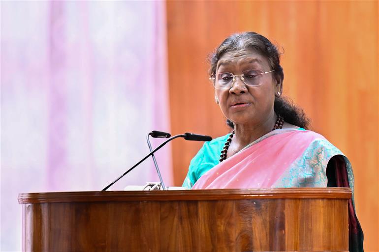 The President of India, Smt. Droupadi Murmu addressing at the unveiling ceremony of the bust of former President of India, late Shri K R Narayanan at Kerala Raj Bhavan, in Kerala on October 23, 2025.