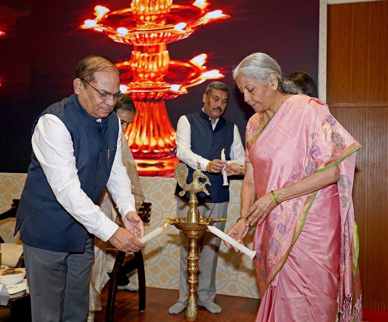 The Union Minister for Finance and Corporate Affairs Smt. Nirmala Sitharaman lighting the lamp during the inauguration of the New Office Building of CGST Bhawan at Ghaziabad, in Uttar Pradesh on October 24, 2025.