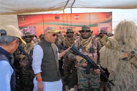 The Union Minister for Defence, Shri Rajnath Singh interacts with soldiers at Laungewala, in Rajasthan on October 24, 2025.