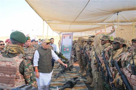 The Union Minister for Defence, Shri Rajnath Singh interacts with soldiers at Laungewala, in Rajasthan on October 24, 2025.