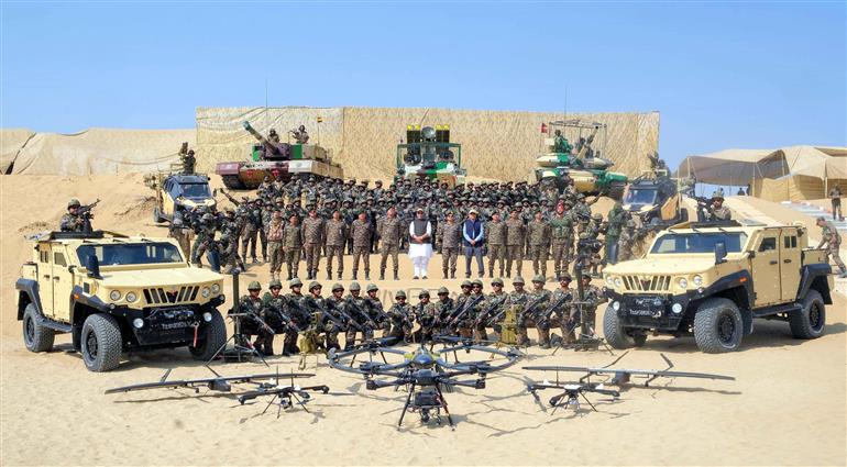The Union Minister for Defence, Shri Rajnath Singh in a group photograph at the dynamic ‘Capability Demonstration Exercise’ at Laungewala, in Rajasthan on October 24, 2025.