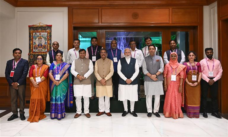 PM in a group photograph with the National Awardee Teachers on the eve of Teachers Day, in New Delhi on September 04, 2025.