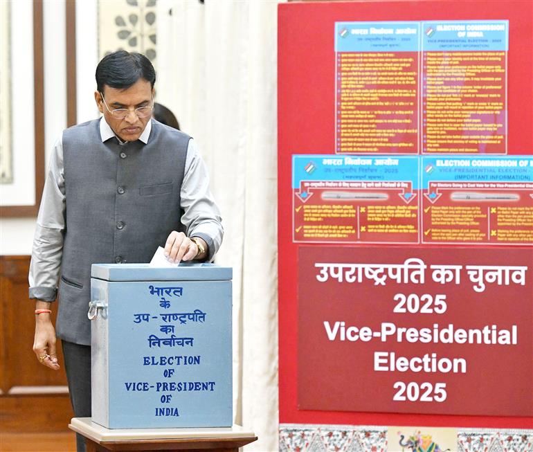 The Union Minister of Labour and Employment & Youth Affairs and Sports, Dr. Mansukh Mandaviya casts his vote for the Vice-Presidential Election 2025 at Parliament House, in New Delhi on September 09, 2025.