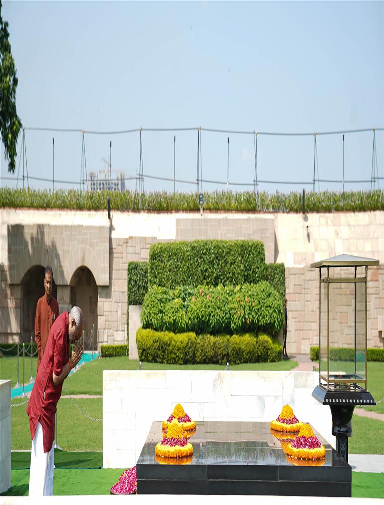 The Vice-President of India Shri C. P. Radhakrishnan pays floral tribute to Mahatma Gandhi at Rajghat, in Delhi on September 12, 2025.