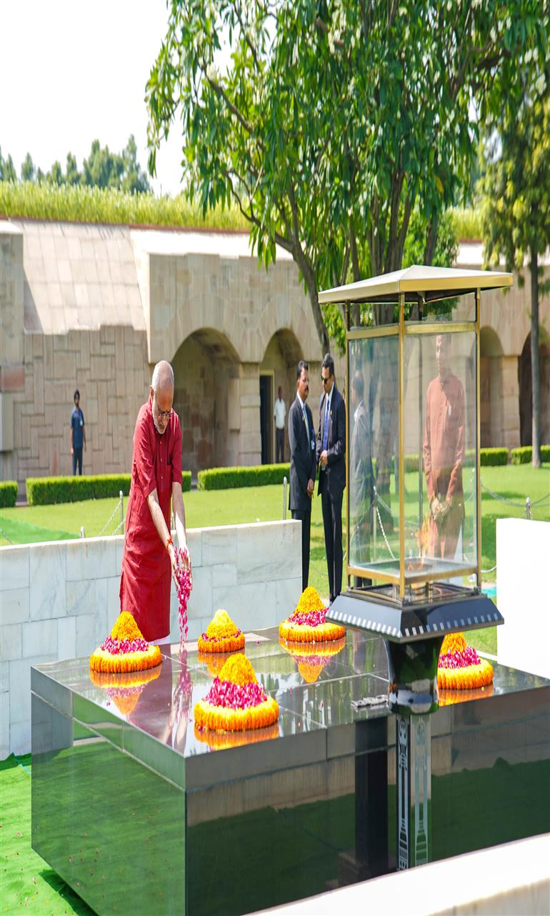 The Vice-President of India Shri C. P. Radhakrishnan pays floral tribute to Mahatma Gandhi at Rajghat, in Delhi on September 12, 2025.