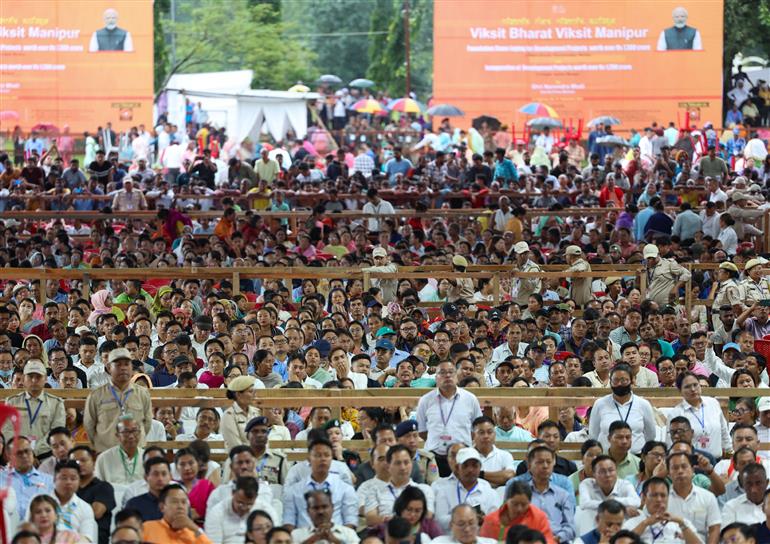 Gathering at the inauguration of various projects at Imphal, in Manipur on September 13, 2025. PM addressing on the occasion.