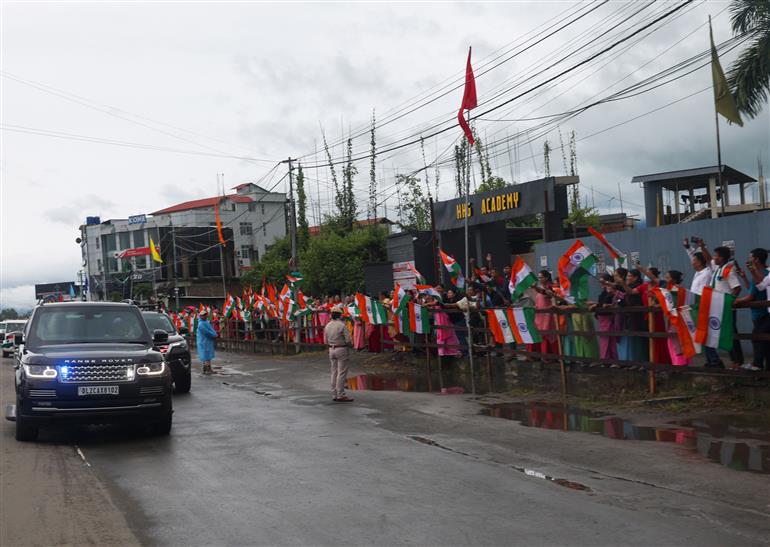 PM receives warm welcome by enthusiastic crowd during the Grand Road Show on his arrival at Imphal, in Manipur on September 13, 2025.