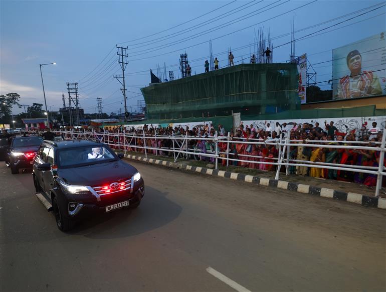 PM receives warm welcome by enthusiastic crowd during the Grand Road Show on his arrival at Guwahati, in Assam on September 13, 2025.