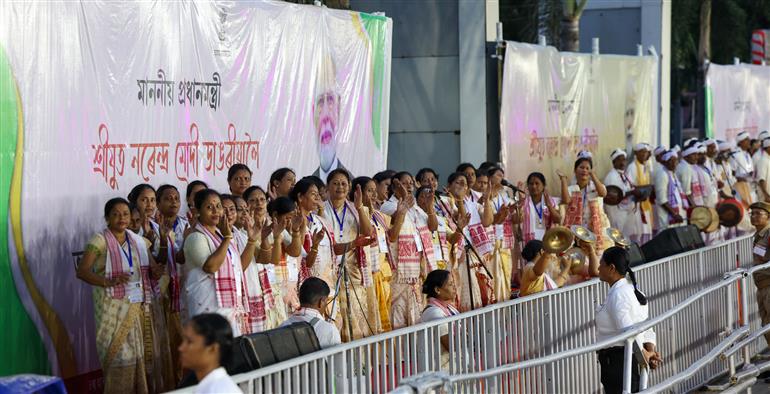 PM receives warm welcome by enthusiastic crowd during the Grand Road Show on his arrival at Guwahati, in Assam on September 13, 2025.