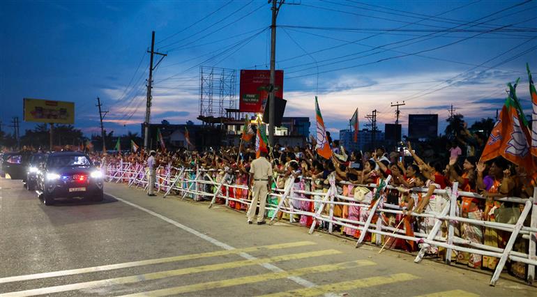 PM receives warm welcome by enthusiastic crowd during the Grand Road Show on his arrival at Guwahati, in Assam on September 13, 2025.