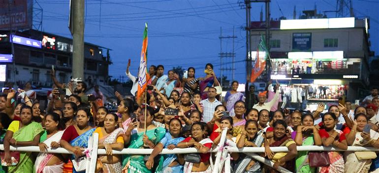 PM receives warm welcome by enthusiastic crowd during the Grand Road Show on his arrival at Guwahati, in Assam on September 13, 2025.