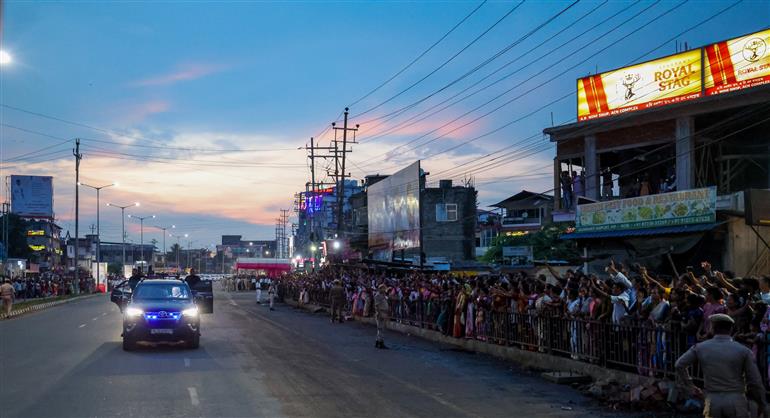 PM receives warm welcome by enthusiastic crowd during the Grand Road Show on his arrival at Guwahati, in Assam on September 13, 2025.