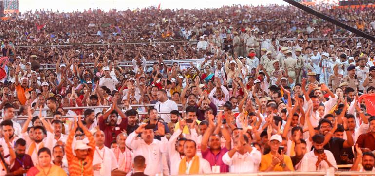 Gathering at the inauguration and laying the foundation stone of multiple development projects at Darrang, in Assam on September 14, 2025. PM addressing on the occasion.