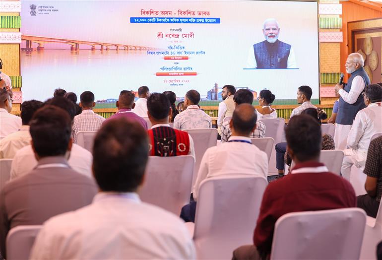 PM interacts with ABEL plant staff and bamboo farmers at Golaghat, in Assam on September 14, 2025.