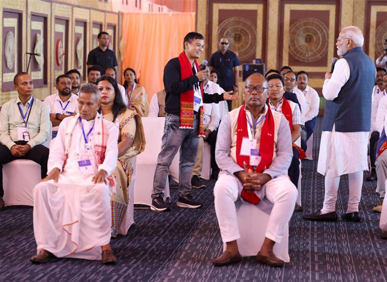 PM interacts with ABEL plant staff and bamboo farmers at Golaghat, in Assam on September 14, 2025.