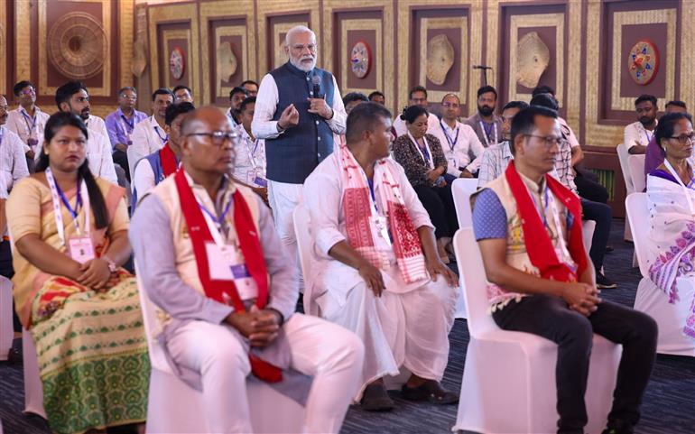 PM interacts with ABEL plant staff and bamboo farmers at Golaghat, in Assam on September 14, 2025.