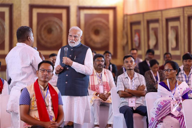 PM interacts with ABEL plant staff and bamboo farmers at Golaghat, in Assam on September 14, 2025.
