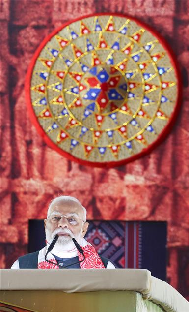 PM addressing the gathering at the laying of foundation Stone of Polypropylene Plant at Golaghat, in Assam on September 14, 2025.