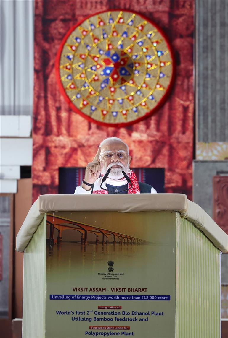 PM addressing the gathering at the laying of foundation Stone of Polypropylene Plant at Golaghat, in Assam on September 14, 2025.