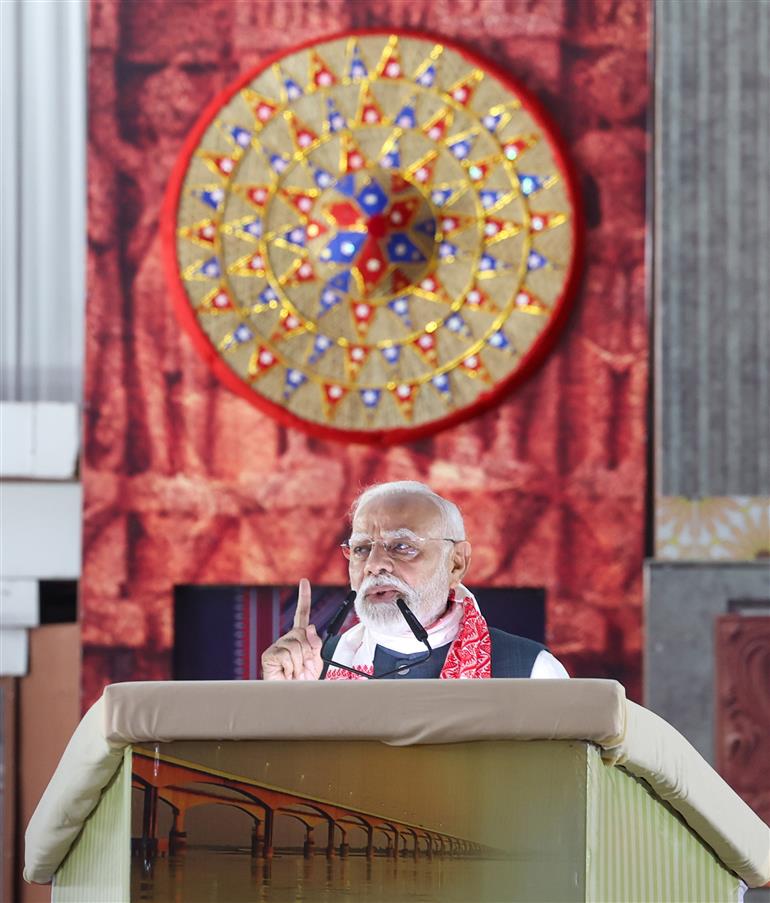 PM addressing the gathering at the laying of foundation Stone of Polypropylene Plant at Golaghat, in Assam on September 14, 2025.
