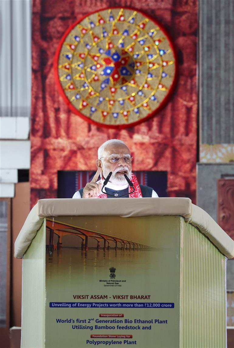 PM addressing the gathering at the laying of foundation Stone of Polypropylene Plant at Golaghat, in Assam on September 14, 2025.