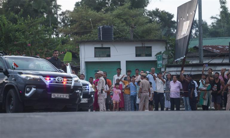 PM receives warm welcome by enthusiastic crowd during the Grand Road Show on his arrival at Golaghat, in Assam on September 14, 2025.