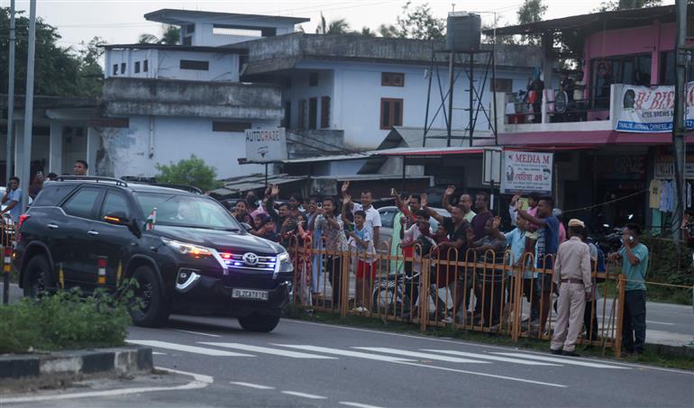 PM receives warm welcome by enthusiastic crowd during the Grand Road Show on his arrival at Golaghat, in Assam on September 14, 2025.