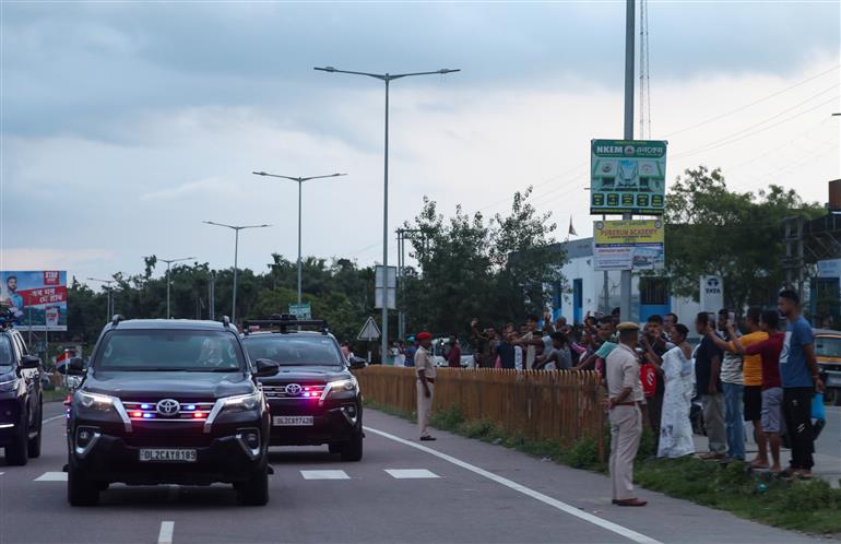 PM receives warm welcome by enthusiastic crowd during the Grand Road Show on his arrival at Golaghat, in Assam on September 14, 2025.