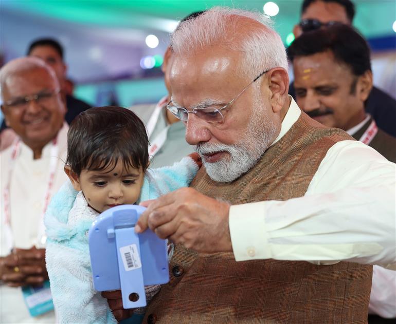 PM takes a walkthrough of Health Kiosks and PM Mitra Park Pavilion at Dhar, in Madhya Pradesh on September 17, 2025.