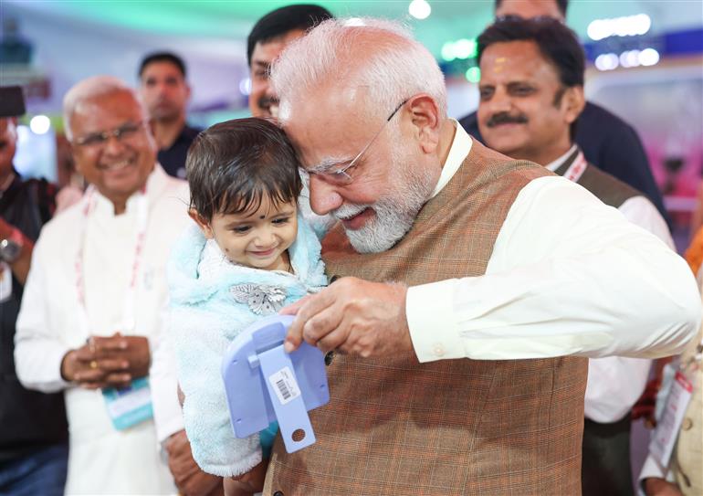 PM takes a walkthrough of Health Kiosks and PM Mitra Park Pavilion at Dhar, in Madhya Pradesh on September 17, 2025.