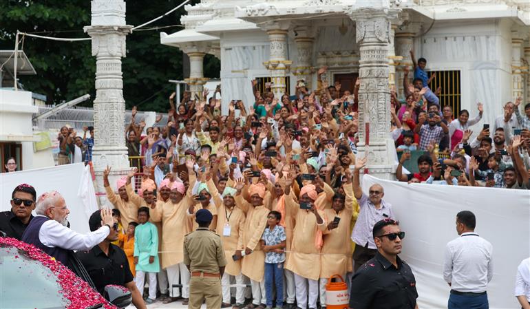 PM receives warm welcome by enthusiastic crowd during the Grand Road Show on his arrival at Bhavnagar, in Gujarat on September 20, 2025.
