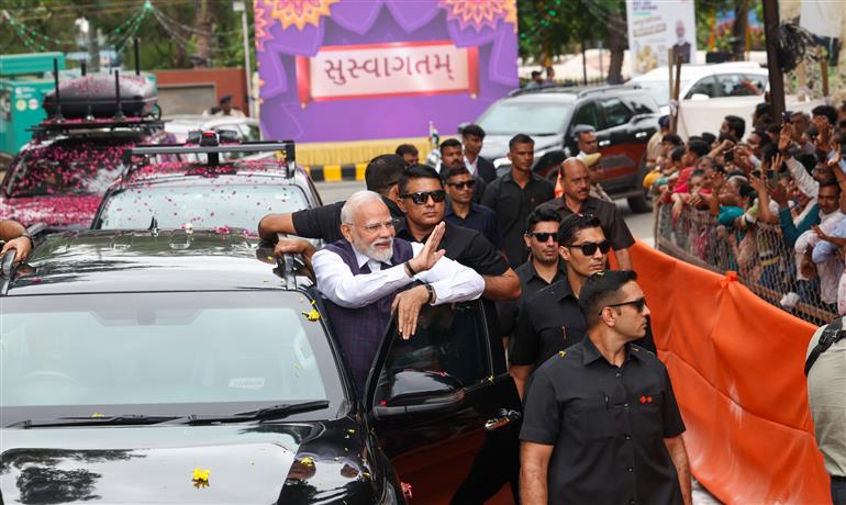 PM receives warm welcome by enthusiastic crowd during the Grand Road Show on his arrival at Bhavnagar, in Gujarat on September 20, 2025.