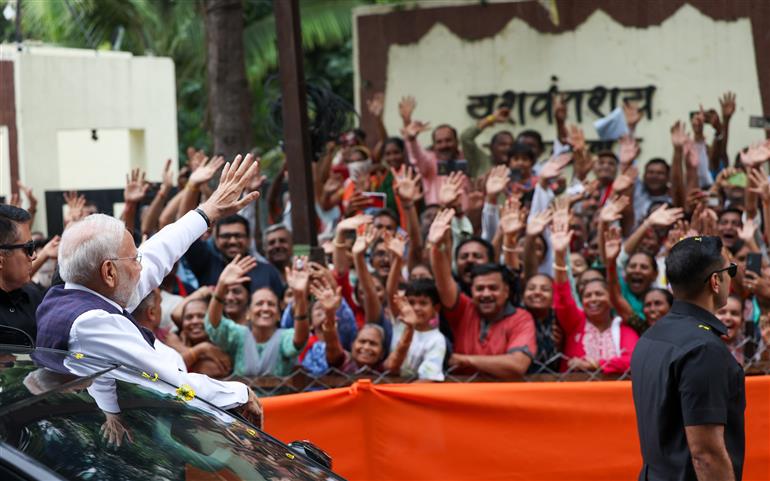 PM receives warm welcome by enthusiastic crowd during the Grand Road Show on his arrival at Bhavnagar, in Gujarat on September 20, 2025.