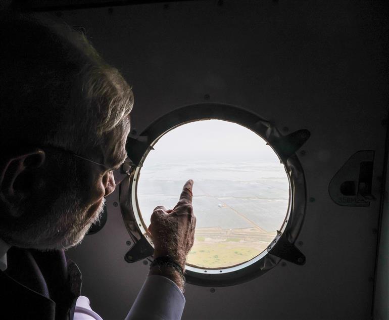 PM undertakes an aerial survey of Dholera Special Investment Region, in Gujarat on September 20, 2025.