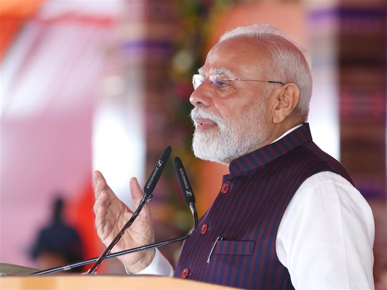 PM addressing at the foundation stone laying and inauguration of multiple development projects at Jharsuguda, in Odisha on September 27, 2025.